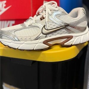 Nike Women's White and Silver Athletic Shoes